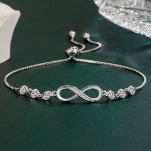 Gorgeous Infinity w/ Diamonds, 8.00 " Inch Long Bracelet  .925 Sterling Silver